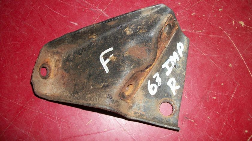 1963 Chevy Impala right inner front bumper brace end  